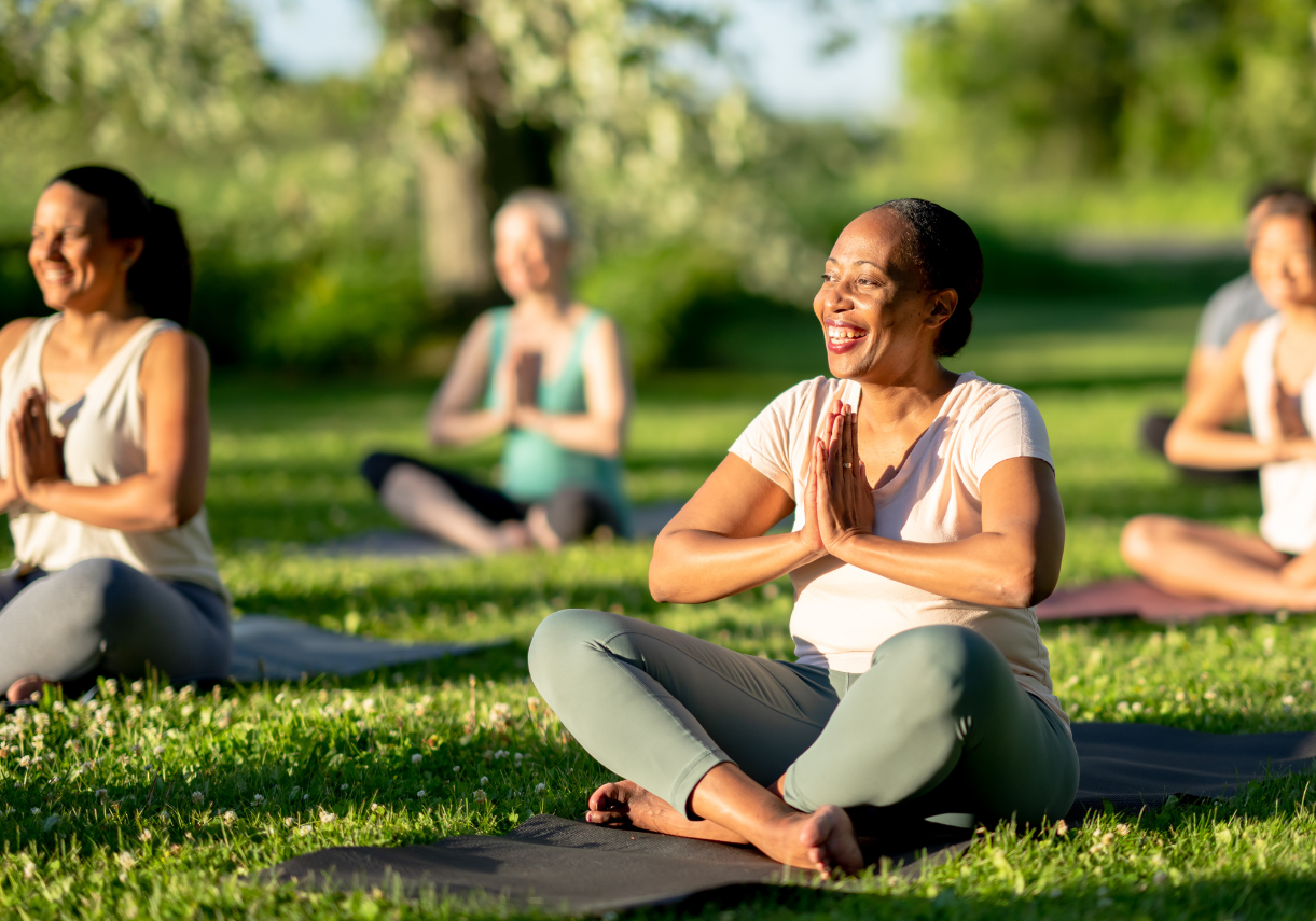 Guests practicing morning yoga in the courtyard